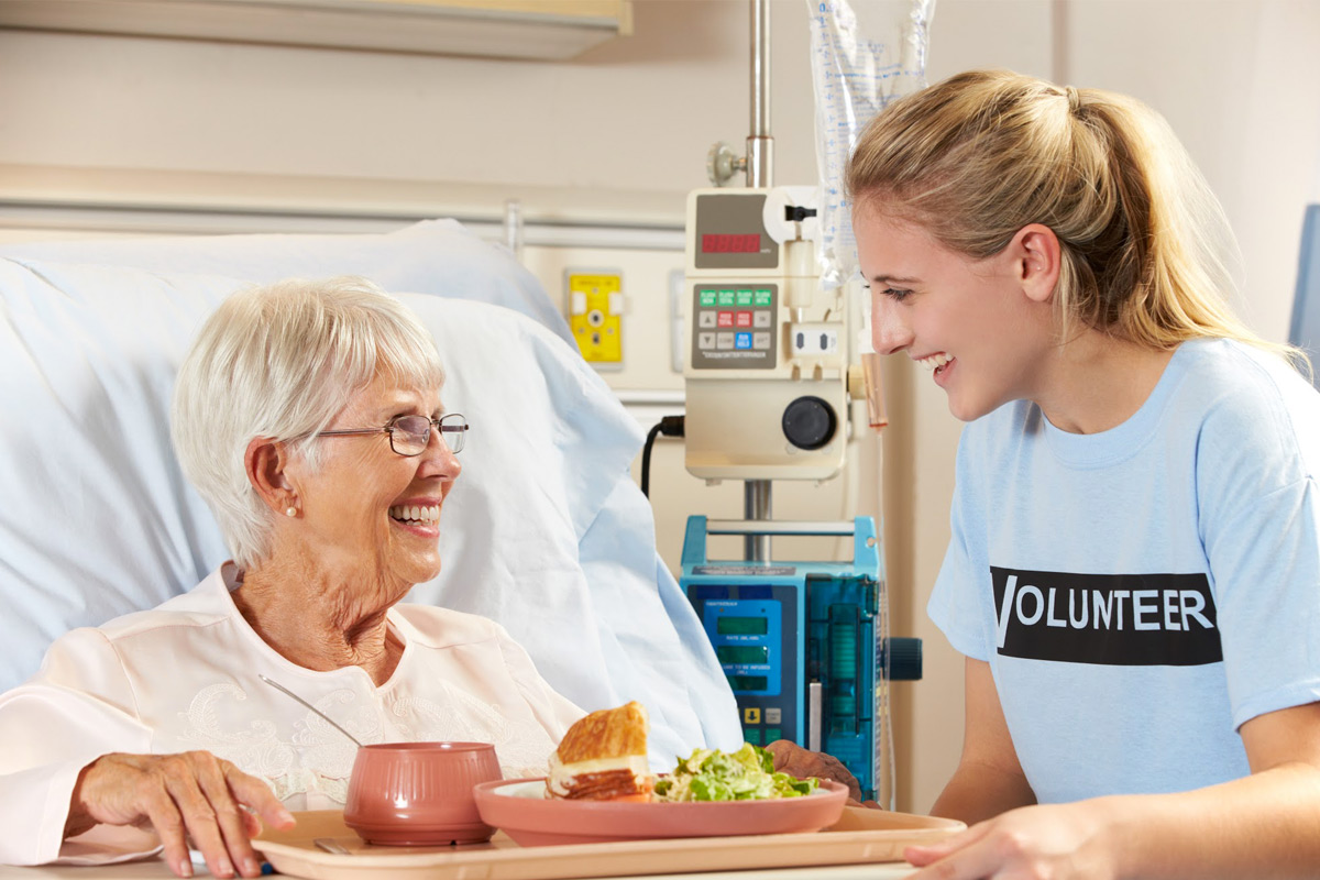 That is one happy volunteer! [Shutterstock]