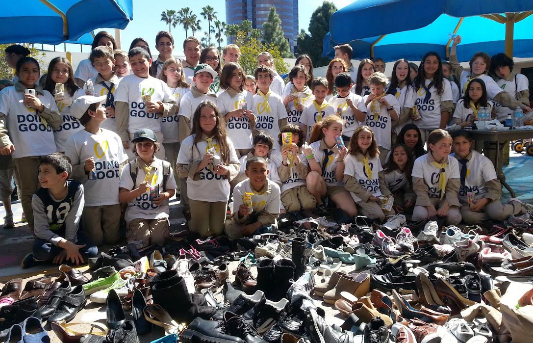 Donación de 2.500 Pares de Zapatos para Niños
