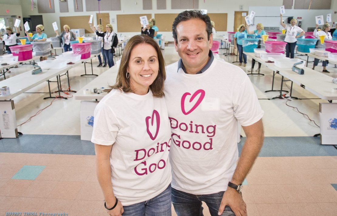 Volunteers from the Jewish Federation of south Palm Beach County smile wide while doing good.