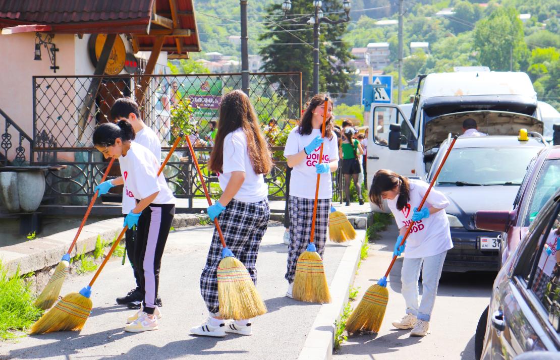 Teens busy with street cleaning
